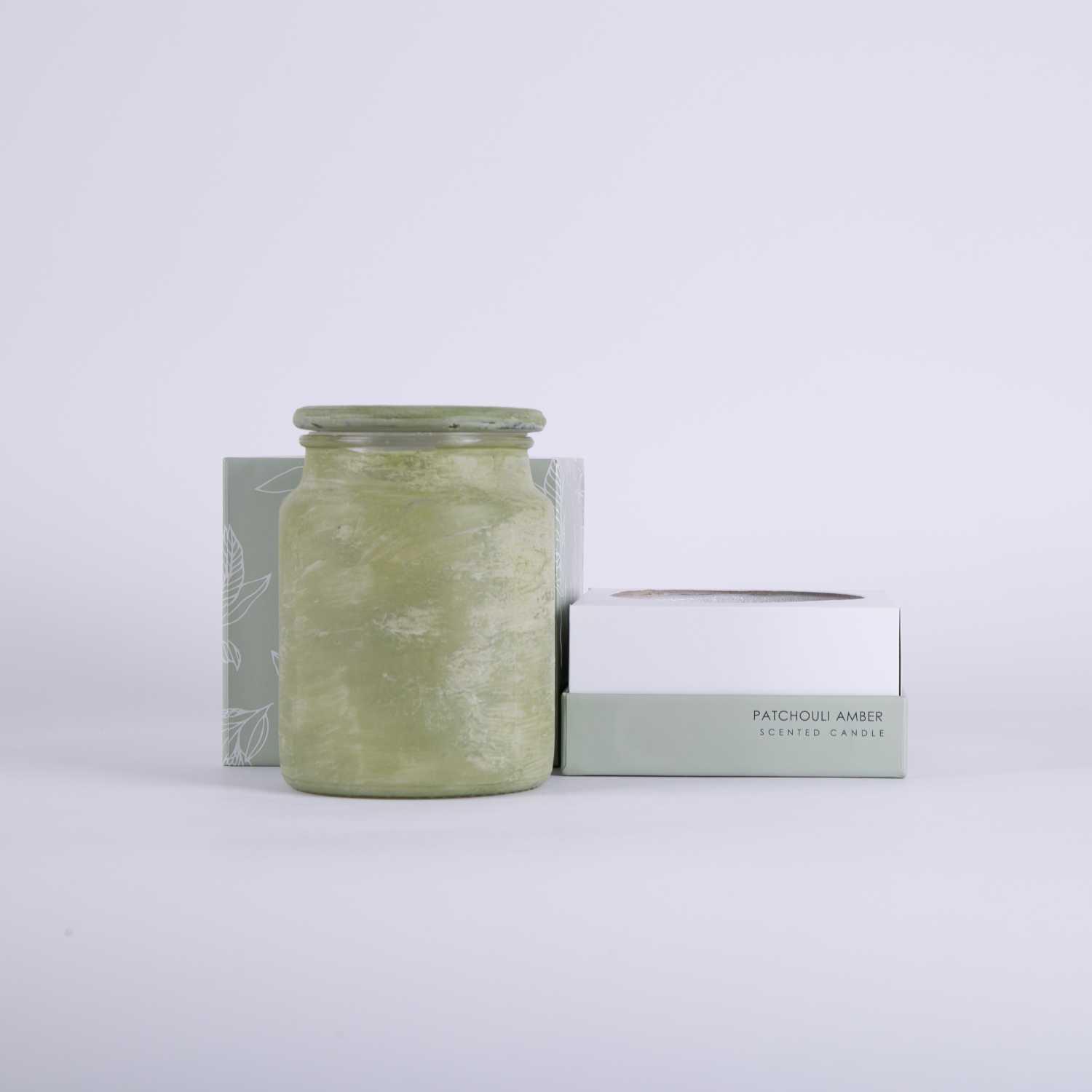 شمعة زجاجية معطرة  عنبر الباتشولي
