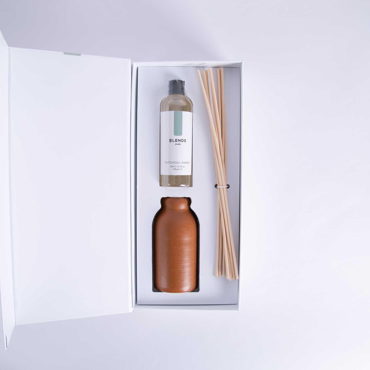 موزع عطور برائحة ريد باتشولي عنبر