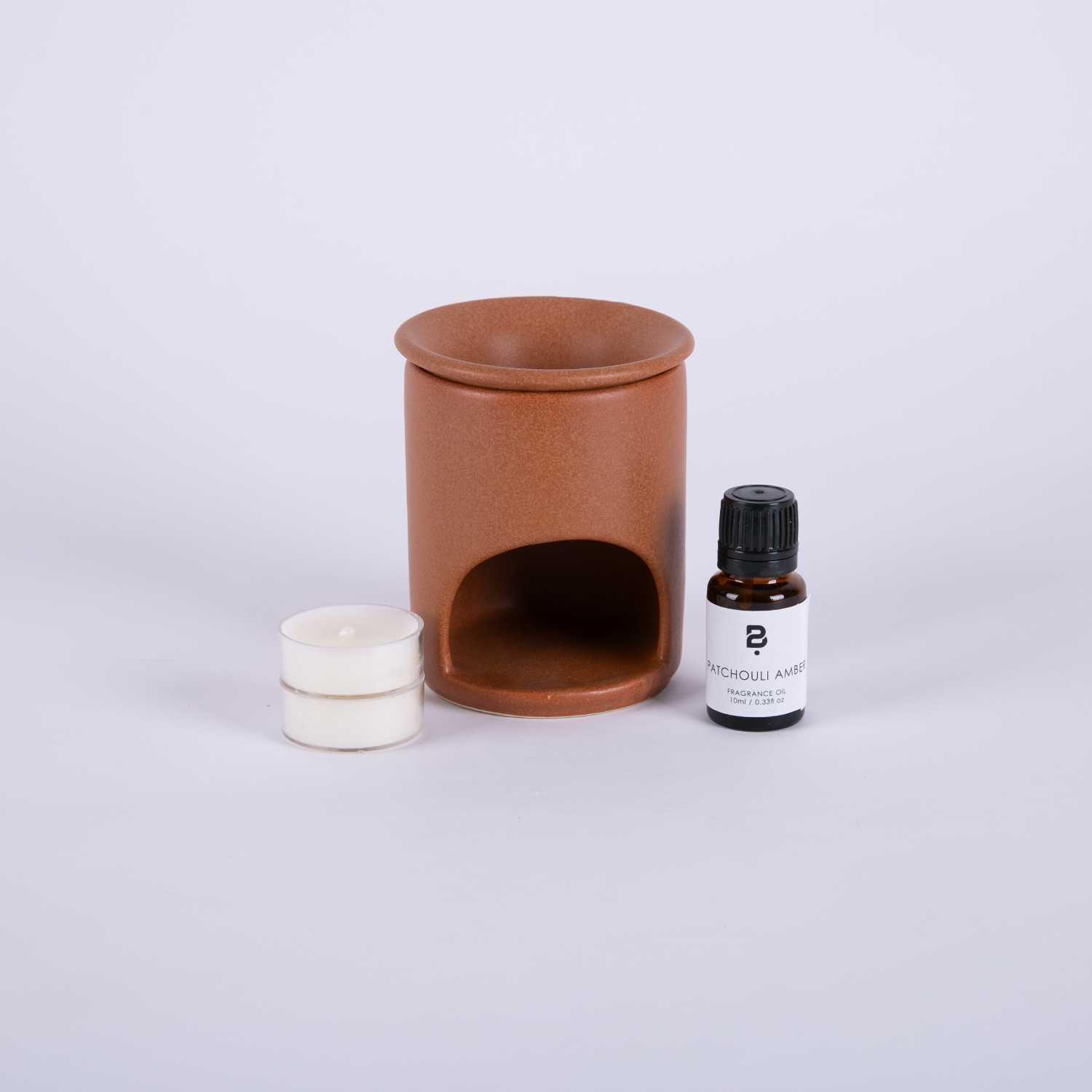 Fragrance lamp with patchouli oil and amber