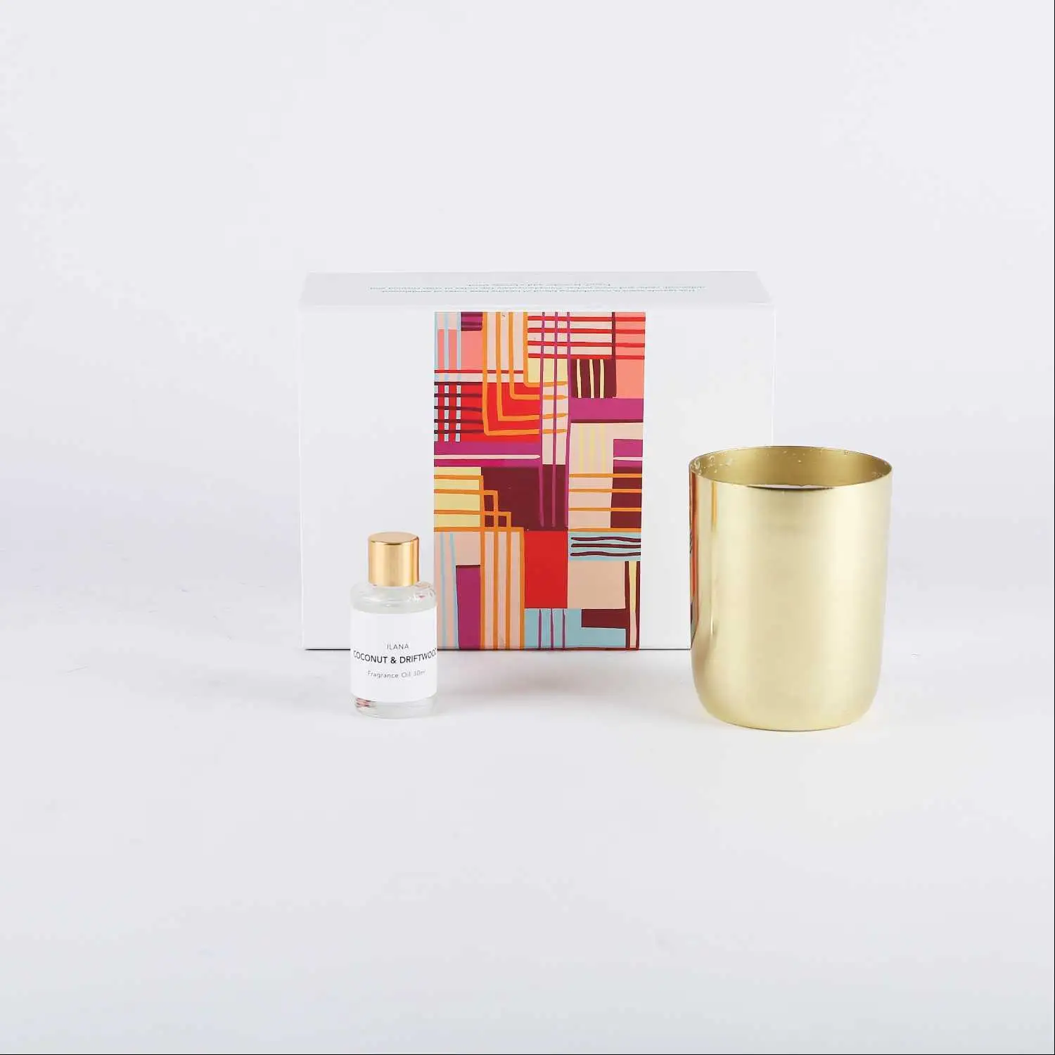 شمعة و معطر برائحة جوز الهند و العنبر مجموعة ايلانا