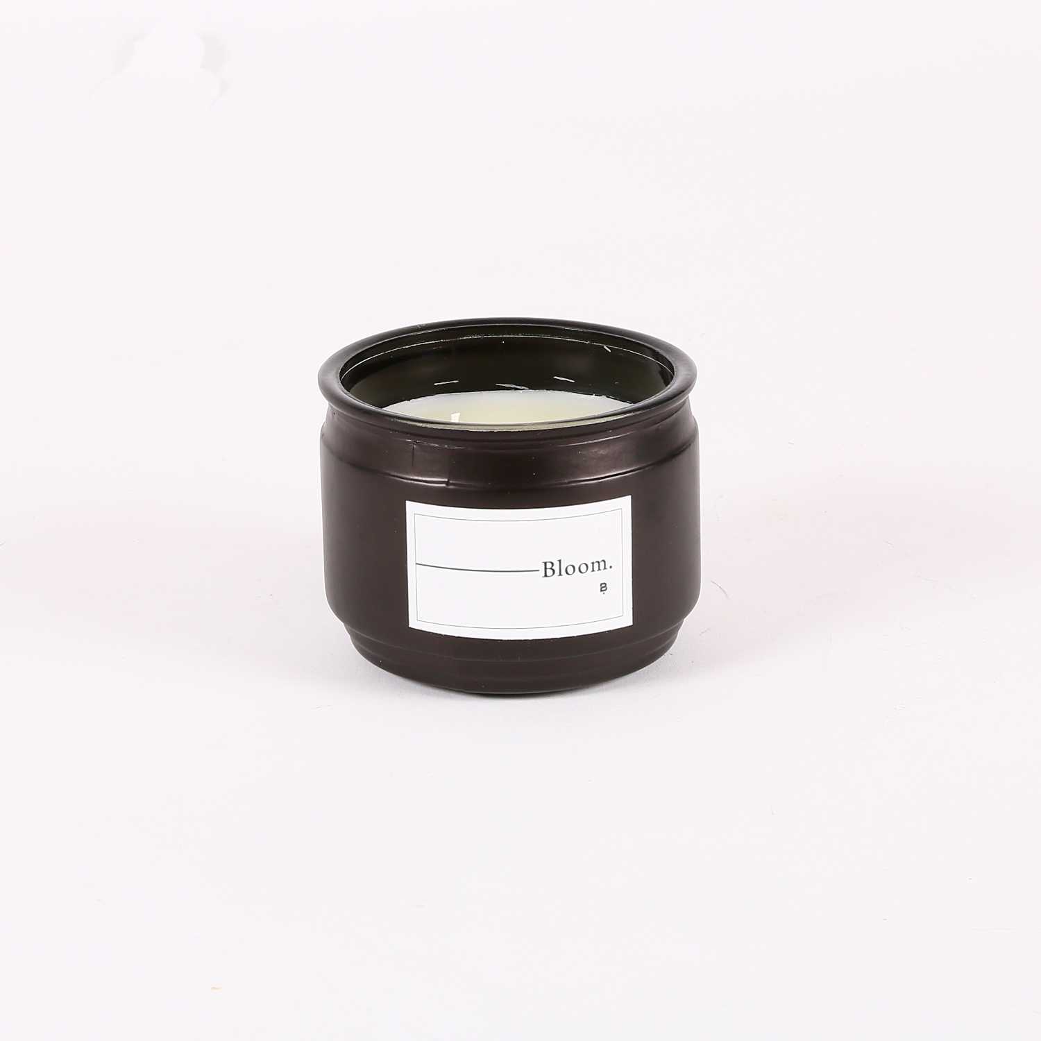 شمعة زجاج معطرة بلووم