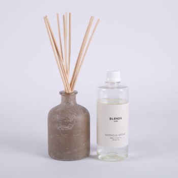Aromatherapy stick diffuser with pieces of Magnolia Grove sticks