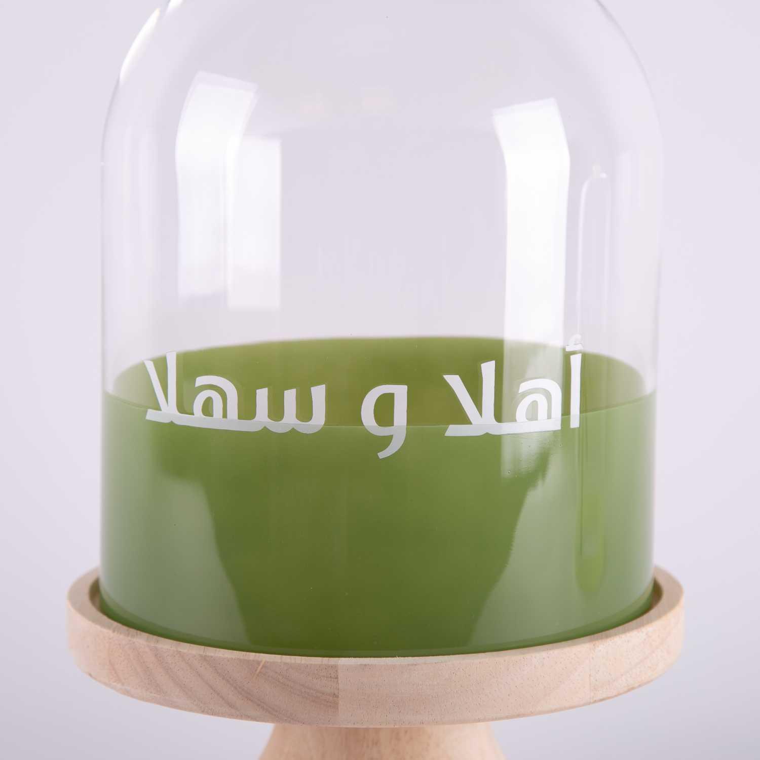 حامل كيك بعبارة "اهلا وسهلا" من زيانا